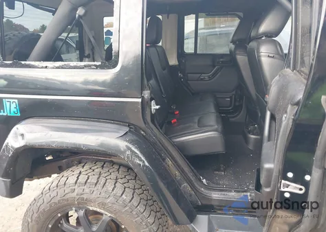 2014 Jeep Wrangler Unlimited Altitude z USA, uszkodzony, nr VIN 1C4HJWEG3EL265946